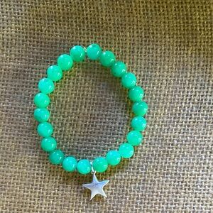 Catch a falling star handcrafted stretch bracelet with sterling star